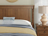Rowlenstown Queen Poster Bed - Brown